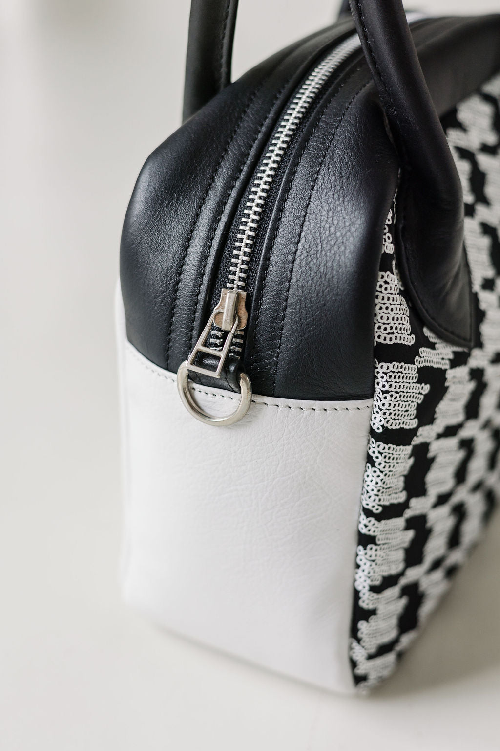 The Postcall | Houndstooth